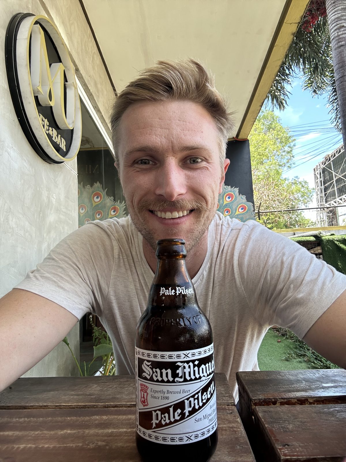 Touchdown in Puerto Princesa - first San Miguel before the bus up to El Nido. (Beer not a great idea before 5 hour minibus)