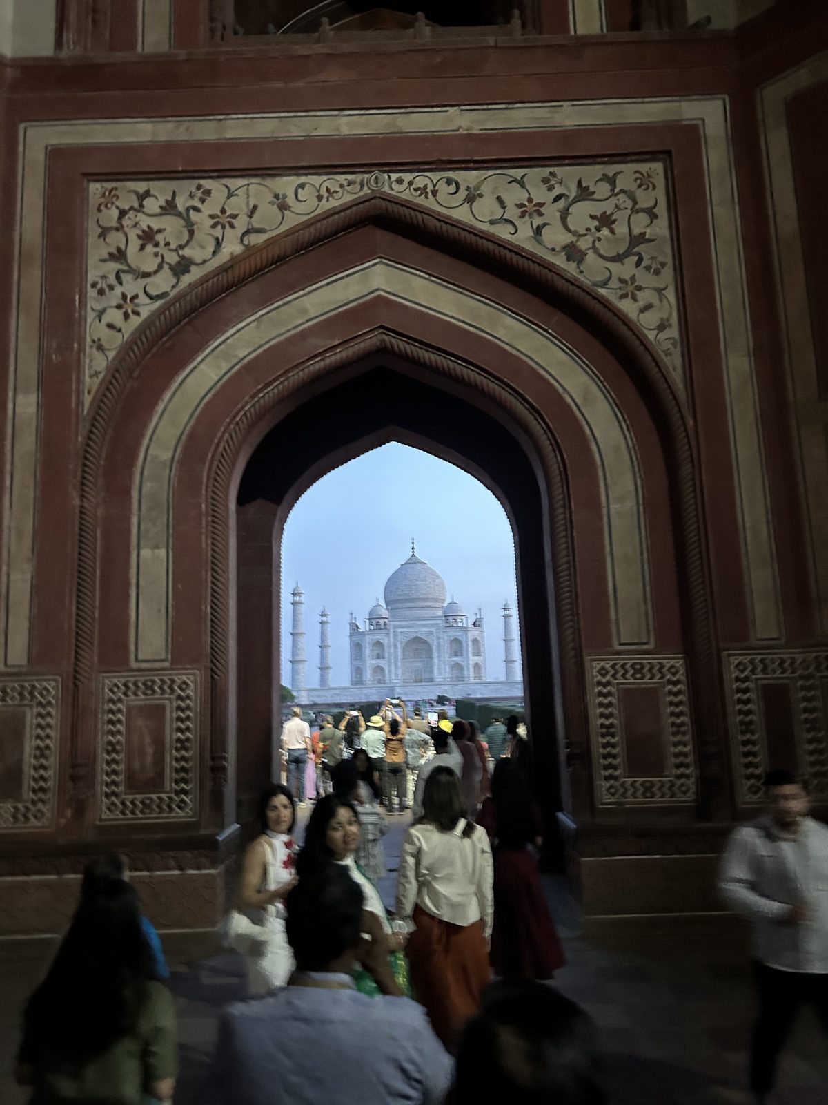 Framing the Taj through the gate.