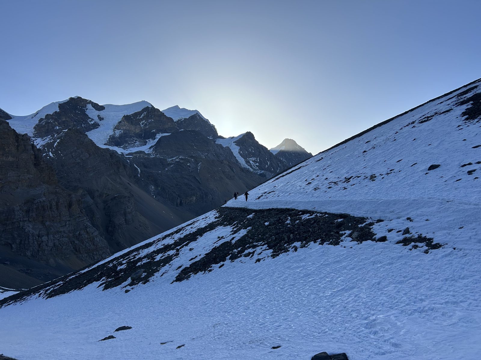 Over the top, into the snowline.