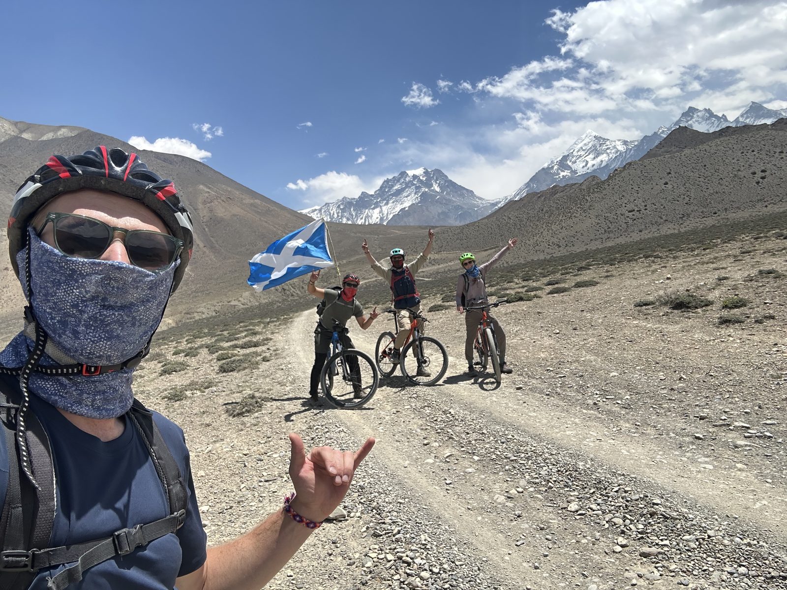 Mountain-biking down the dirt road.