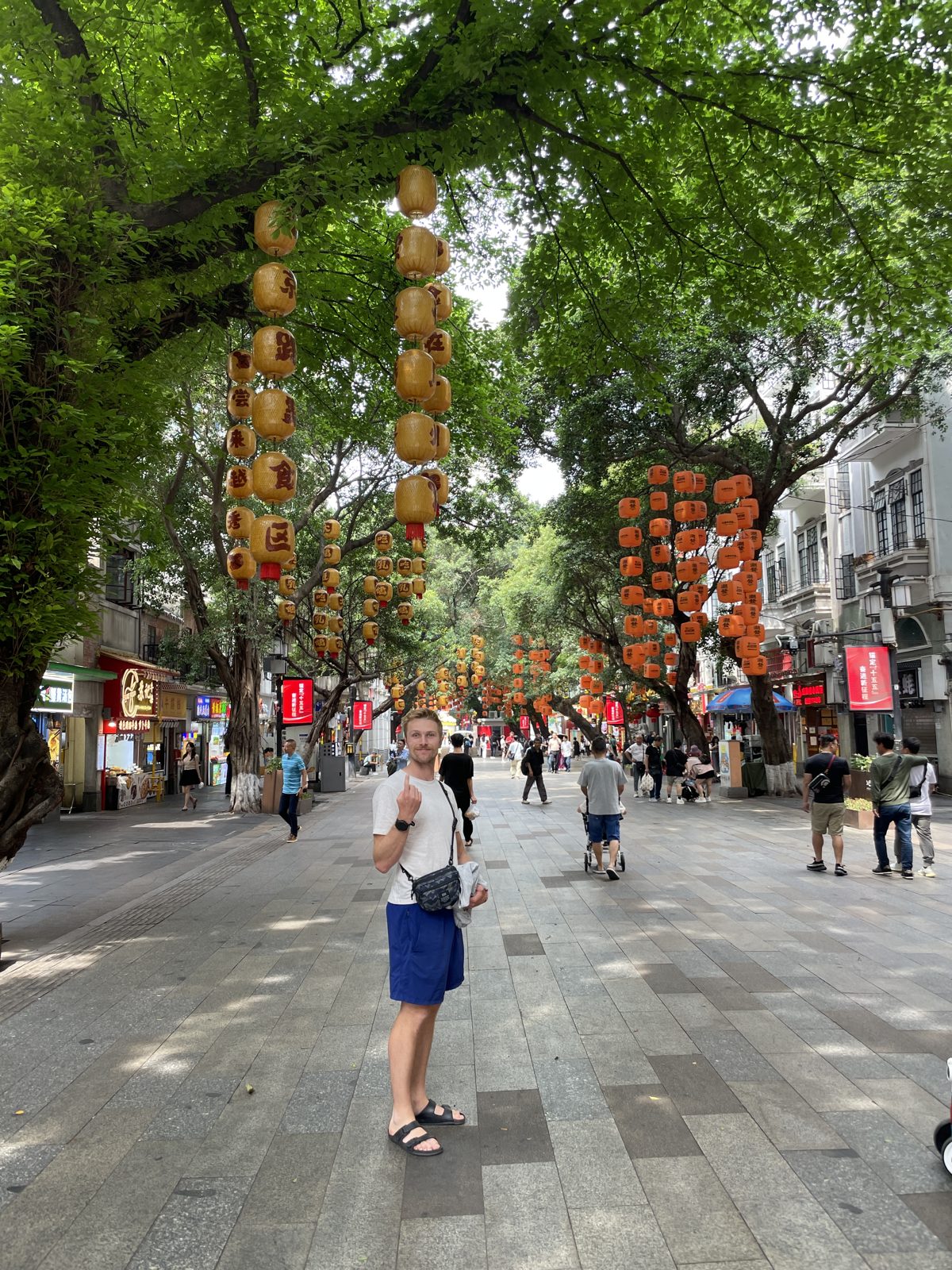 Under the wishing lanterns strung through the old town.
