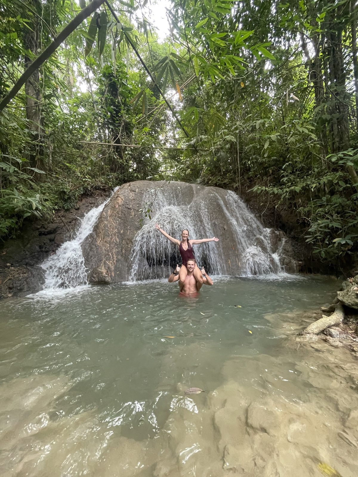 Sitting under the Cambugahay falls.